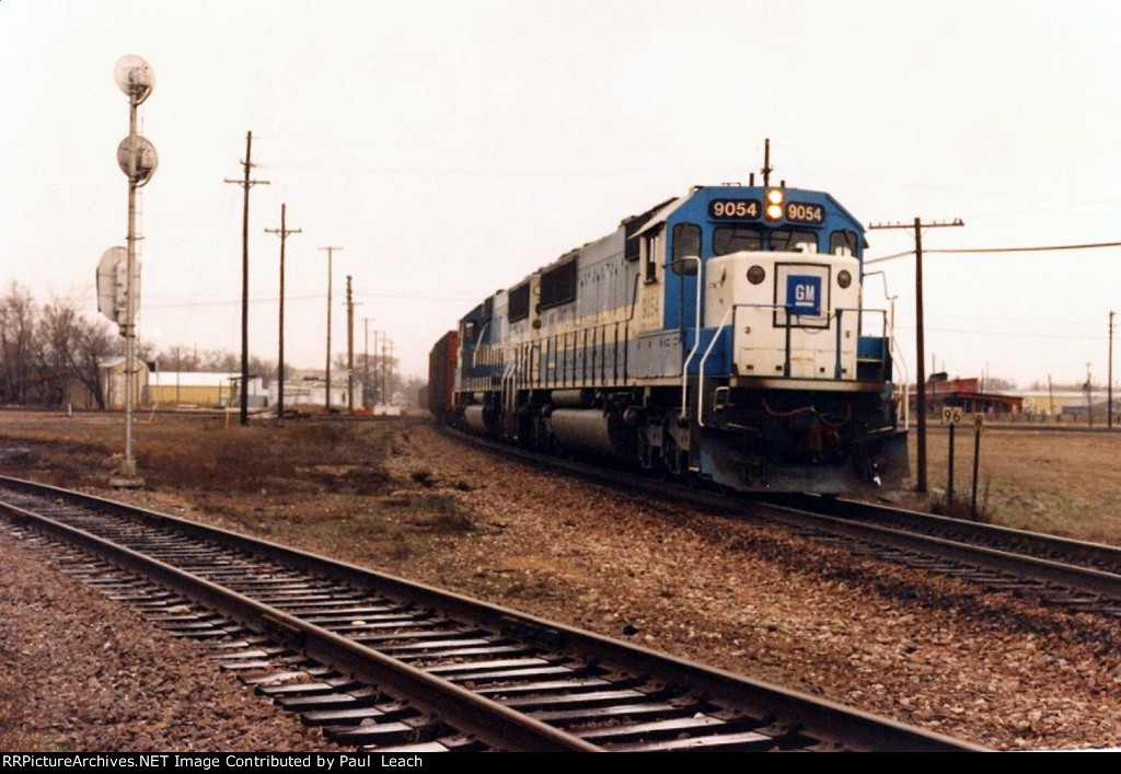 Eastbound loaded coal train comes over the diamonds